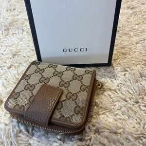 GUCCI GG CANVAS FOLDED ZIPPED WALLET
